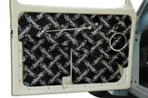 Dynamat shown on a beetle door panel