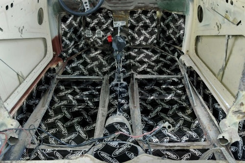 Dynamat shown on a Beetle floor surfaces